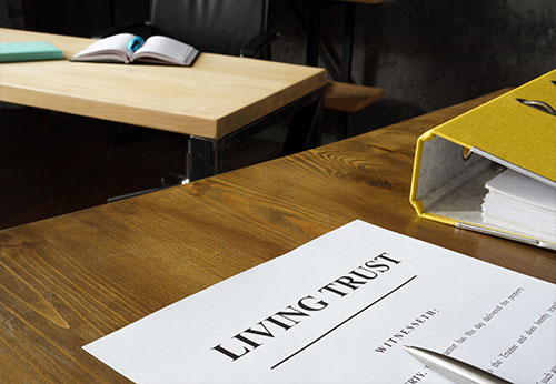 LIVING TRUST document on a desk next to a file folder, representing rust Attorney In Beaver County
